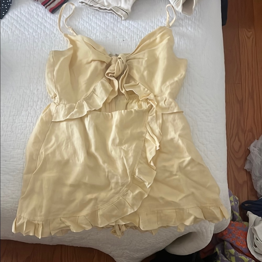 Seek the Label / LF Yellow Ruffled Front tie romper